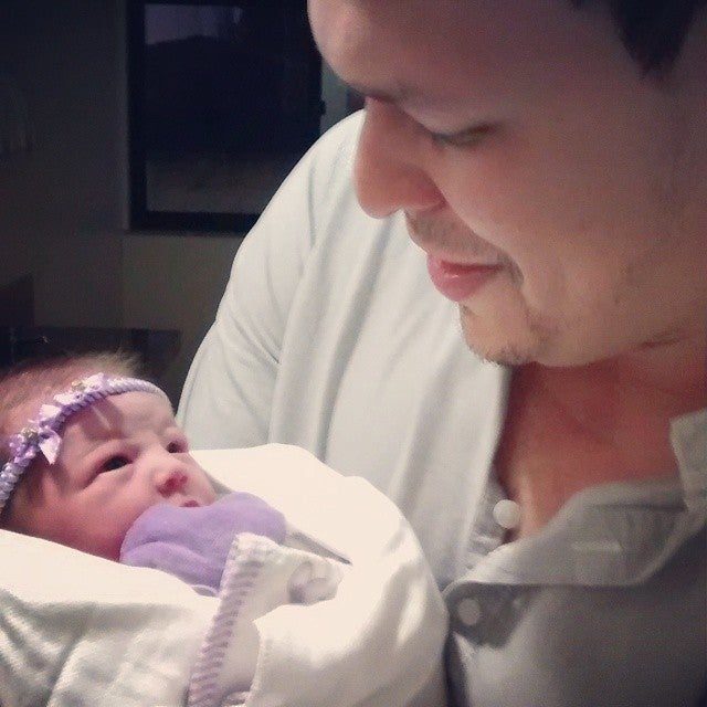 Com minha filha recém-nascida, Maria Alice.